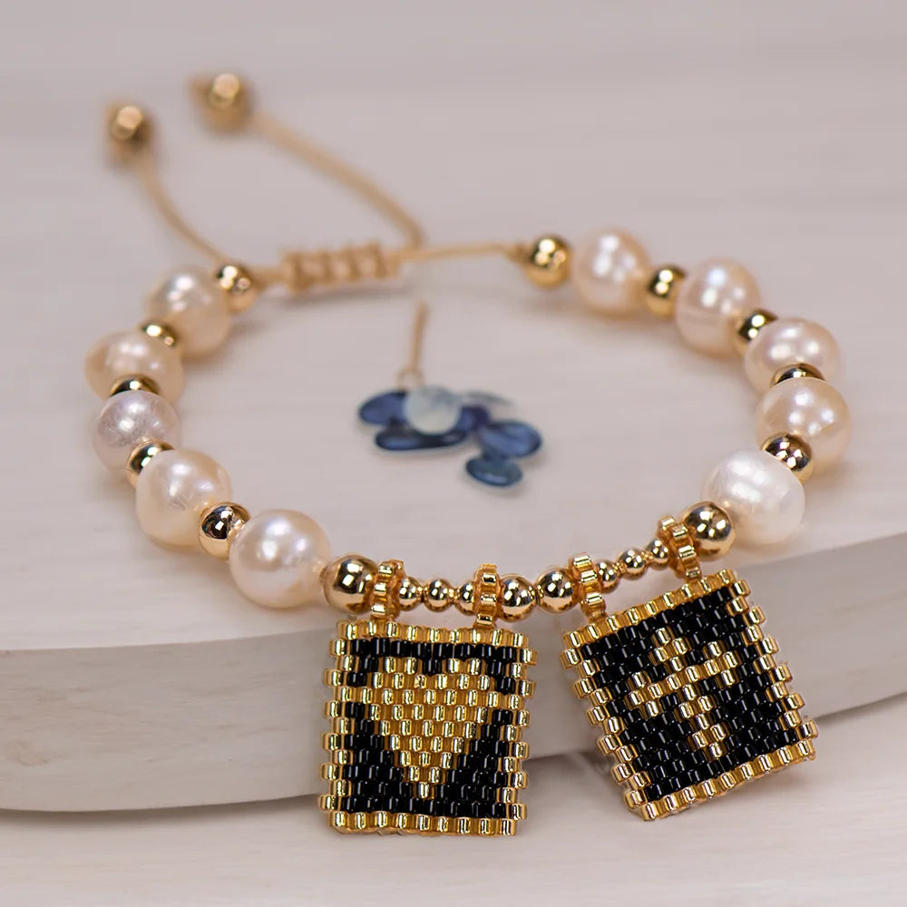Pulseira de Pérola com Coração e Cruz - Sagrado Tesouro